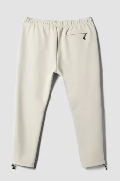 PANTALÓN TECH DUSTY CREAM