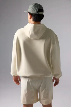 SUDADERA CON CAPUCHA TECH DUSTY CREAM